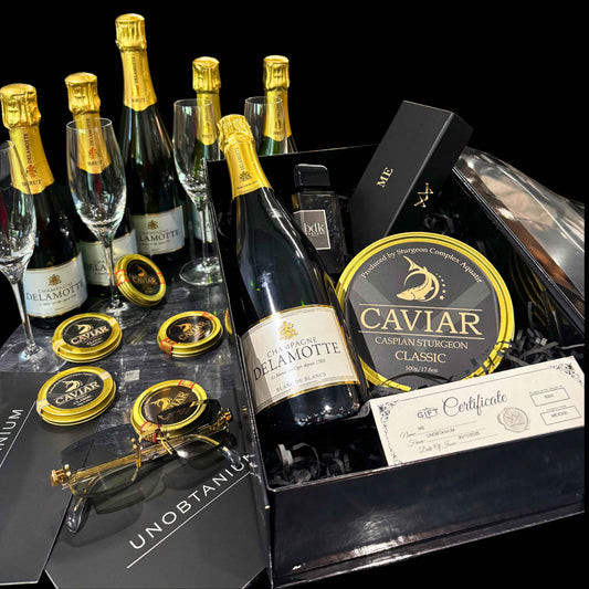 A Celebration Box — With your choice of Champagne, Caviar, Fragrance & AM Eyewear Voucher